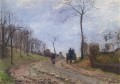 transport sur une route de campagne hiver périphérie de louveciennes 1872 Camille Pissarro paysage